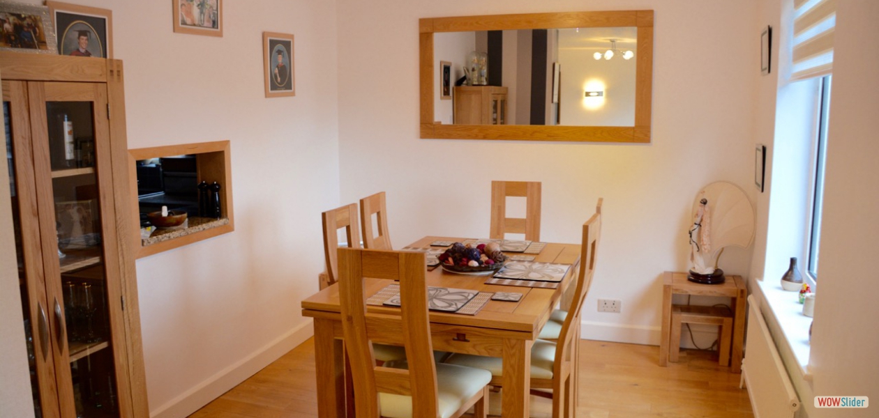 The dinning room, which also has the benefit of solid Oak floors, has a table for 6 and can be extended to seat 8 or more.